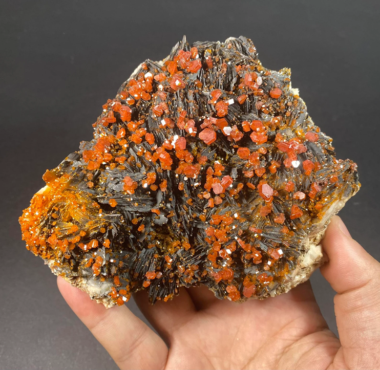 Vanadinite mineral specimen from Morocco, showcasing hexagonal prisms