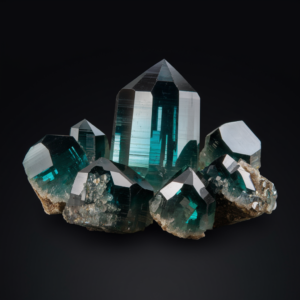Faceted Musgravite gemstone with deep grey-green color and high brilliance